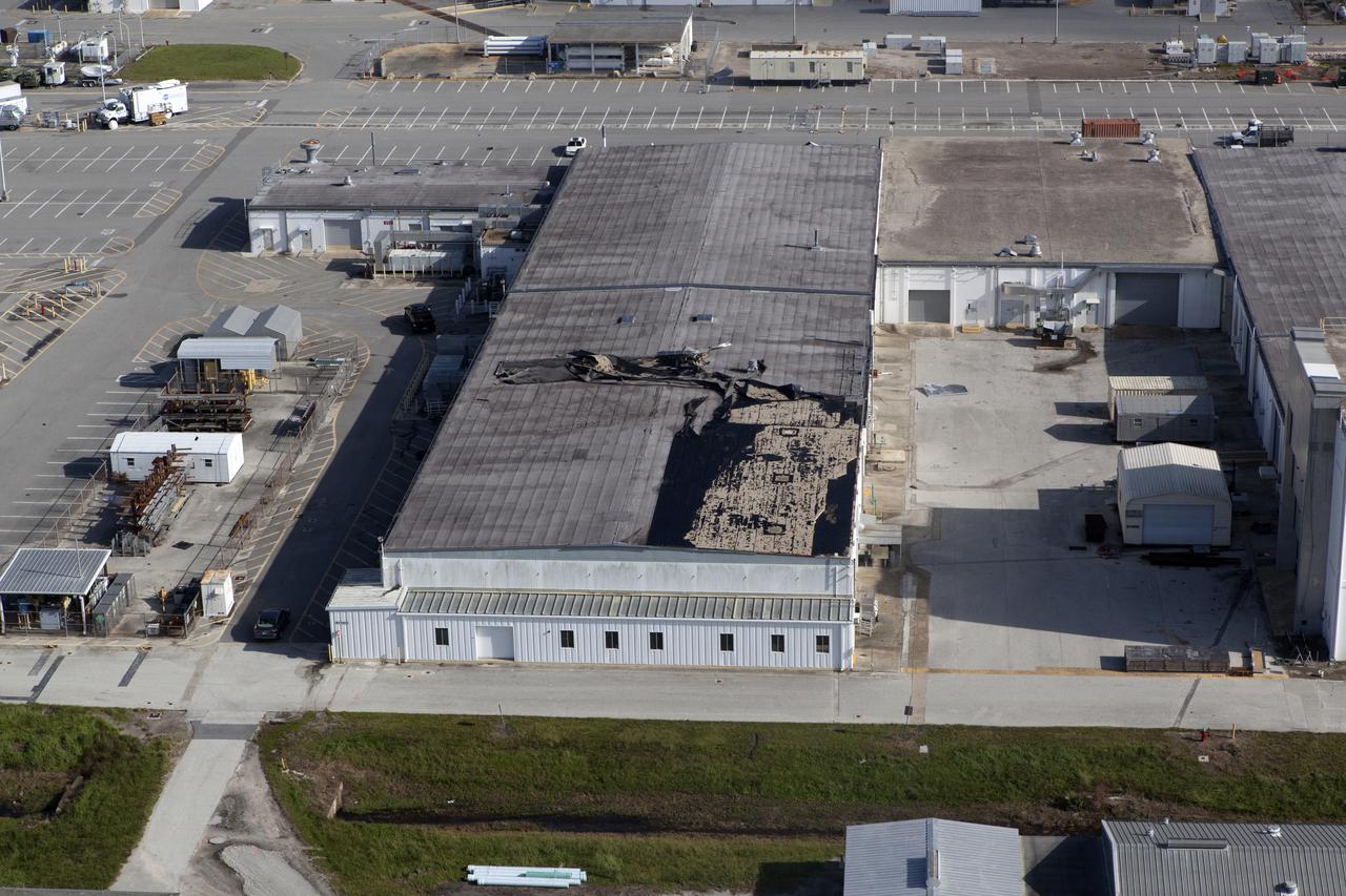 An industrial building behind the Space Station Processing Facility (SSPF) is seen during an aerial survey of NASA's Kennedy Space Center in Florida on September 12, 2017. The survey was performed to identify structures and facilities that may have sustained damage from Hurricane Irma as the storm passed Kennedy on September 10, 2017. NASA closed the center ahead of the storm's onset and only a small team of specialists known as the Rideout Team was on the center as the storm approached and passed.
