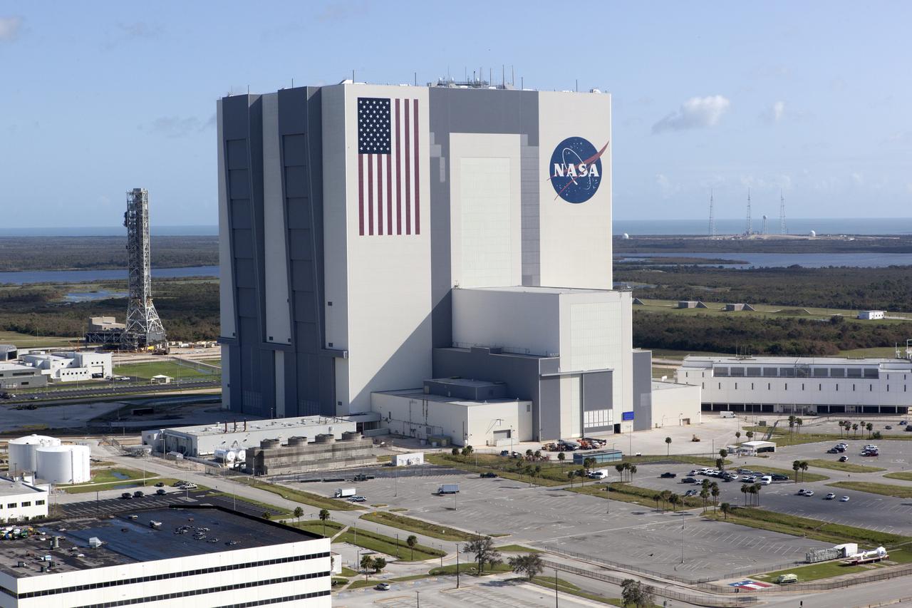 The Mobile Launcher (ML), Vehicle Assembly Building (VAB), Launch Control Center (LCC), and Launch Complex 39 surrounding areas are seen during an aerial survey of NASA's Kennedy Space Center in Florida on September 12, 2017. The survey was performed to identify structures and facilities that may have sustained damage from Hurricane Irma as the storm passed Kennedy on September 10, 2017. NASA closed the center ahead of the storm's onset and only a small team of specialists known as the Rideout Team was on the center as the storm approached and passed.