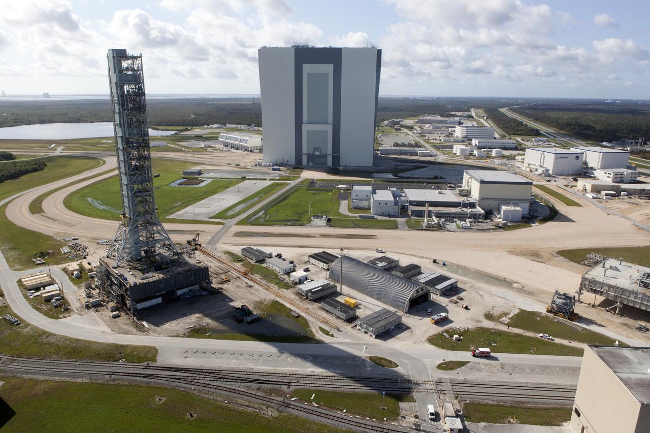 The Mobile Launcher (ML), Launch Control Center (LCC), Vehicle Assembly Building (VAB), and Launch Complex 39 surrounding areas are seen during an aerial survey of NASA's Kennedy Space Center in Florida on September 12, 2017. The survey was performed to identify structures and facilities that may have sustained damage from Hurricane Irma as the storm passed Kennedy on September 10, 2017. NASA closed the center ahead of the storm's onset and only a small team of specialists known as the Rideout Team was on the center as the storm approached and passed.