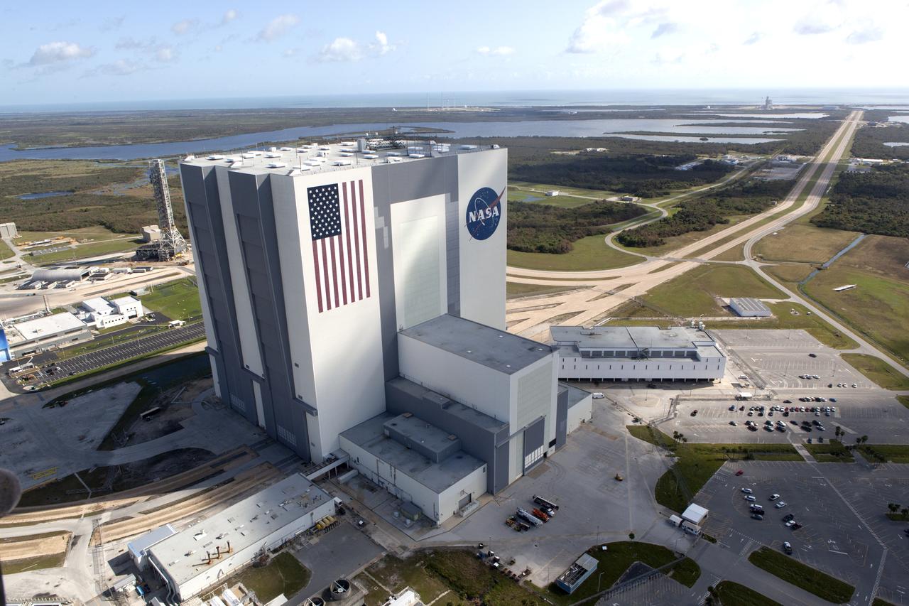 The Mobile Launcher (ML), Vehicle Assembly Building (VAB), Launch Control Center (LCC), and Launch Complex 39 surrounding areas are seen during an aerial survey of NASA's Kennedy Space Center in Florida on September 12, 2017. The survey was performed to identify structures and facilities that may have sustained damage from Hurricane Irma as the storm passed Kennedy on September 10, 2017. NASA closed the center ahead of the storm's onset and only a small team of specialists known as the Rideout Team was on the center as the storm approached and passed.