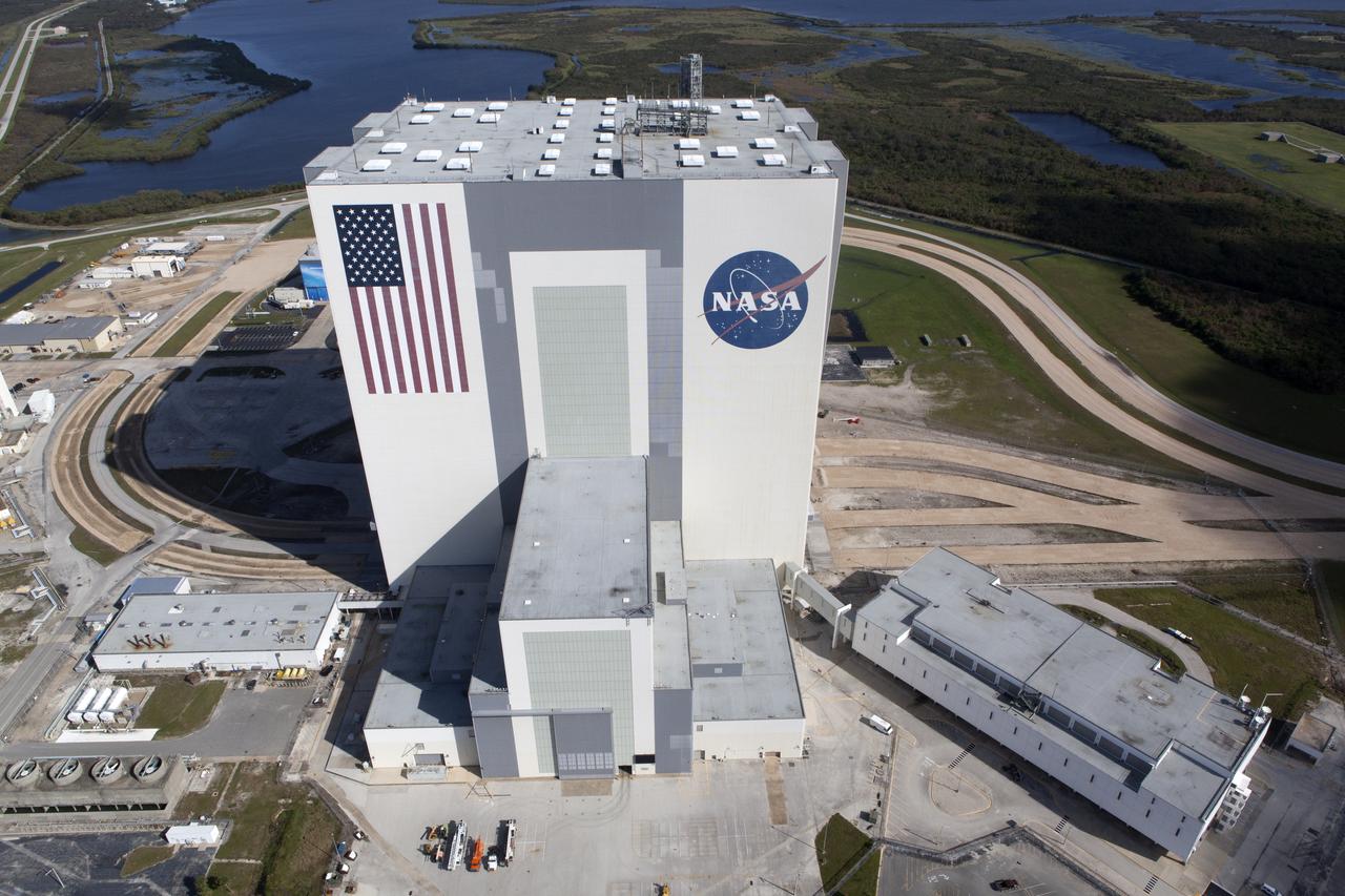 The Vehicle Assembly Building (VAB), Launch Control Center (LCC), and Launch Complex 39 surrounding areas are seen during an aerial survey of NASA's Kennedy Space Center in Florida on September 12, 2017. The survey was performed to identify structures and facilities that may have sustained damage from Hurricane Irma as the storm passed Kennedy on September 10, 2017. NASA closed the center ahead of the storm's onset and only a small team of specialists known as the Rideout Team was on the center as the storm approached and passed.