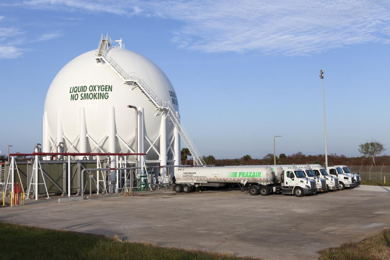 Several Praxair trucks carrying their loads of liquid oxygen, or LO2, have arrived at Launch Pad 39B at NASA's Kennedy Space Center in Florida. The trucks will offload LO2 slowly into a giant storage sphere located at the northwest corner of the pad to gradually chill it down from normal temperature to about negative 298 degrees Fahrenheit, during the first major integrated operation to prepare for the launch of the agency's Orion spacecraft atop the Space Launch System (SLS) rocket. The Ground Systems Development and Operations Program is overseeing upgrades and modifications to pad B to support the launch of the SLS and Orion spacecraft for Exploration Mission-1, deep space missions and NASA’s journey to Mars.