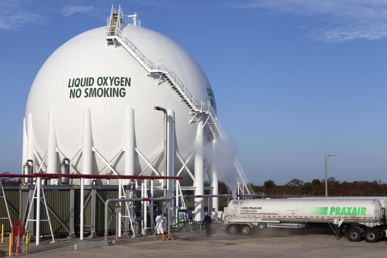 Several Praxair trucks carrying their loads of liquid oxygen, or LO2, have arrived at Launch Pad 39B at NASA's Kennedy Space Center in Florida. A mist is visible as LO2 is offloaded from one of the trucks into the giant storage sphere located at the northwest corner of the pad has begun. The sphere will gradually be chilled down from normal temperature to about negative 298 degrees Fahrenheit, during the first major integrated operation to prepare for the launch of the agency's Orion spacecraft atop the Space Launch System (SLS) rocket. The Ground Systems Development and Operations Program is overseeing upgrades and modifications to pad B to support the launch of the SLS and Orion spacecraft for Exploration Mission-1, deep space missions and NASA’s journey to Mars.