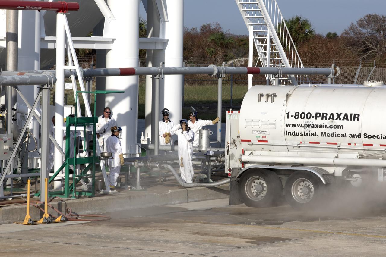 Mist or vapor is visible as a Praxair truck slowly transfers its load of liquid oxygen, or LO2, into a giant storage sphere at the northwest corner of Launch Pad 39B at NASA's Kennedy Space Center in Florida. The sphere will gradually be chilled down from normal temperature to about negative 298 degrees Fahrenheit, during the first major integrated operation to prepare for the launch of the agency's Orion spacecraft atop the Space Launch System (SLS) rocket. The Ground Systems Development and Operations Program is overseeing upgrades and modifications to pad B to support the launch of the SLS and Orion spacecraft for Exploration Mission-1, deep space missions and NASA’s journey to Mars.