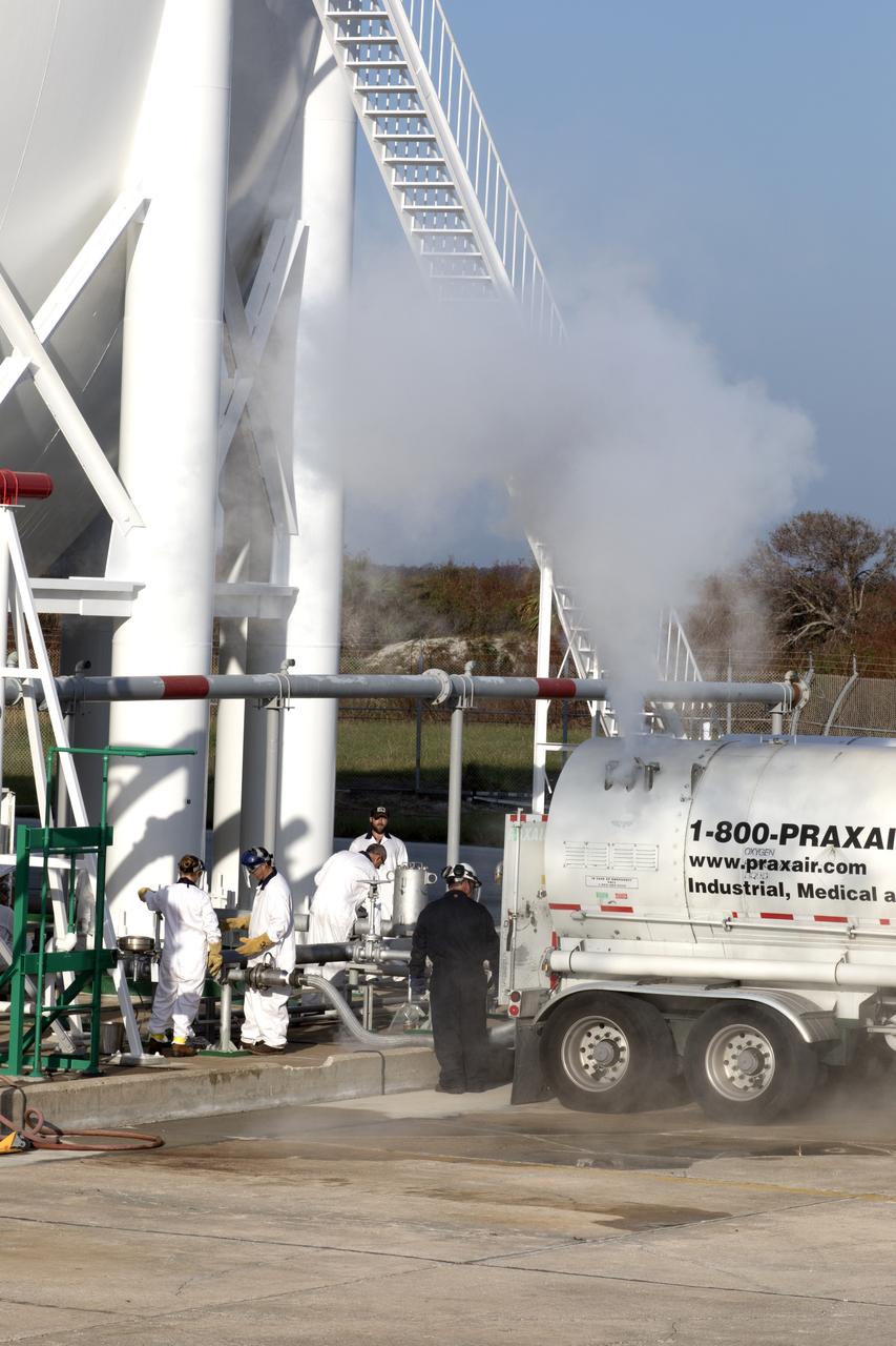 A large plume of mist or vapor is visible as a Praxair truck slowly transfers its load of liquid oxygen, or LO2, into a giant storage sphere at the northwest corner of Launch Pad 39B at NASA's Kennedy Space Center in Florida. The sphere will gradually be chilled down from normal temperature to about negative 298 degrees Fahrenheit, during the first major integrated operation to prepare for the launch of the agency's Orion spacecraft atop the Space Launch System (SLS) rocket. The Ground Systems Development and Operations Program is overseeing upgrades and modifications to pad B to support the launch of the SLS and Orion spacecraft for Exploration Mission-1, deep space missions and NASA’s journey to Mars.