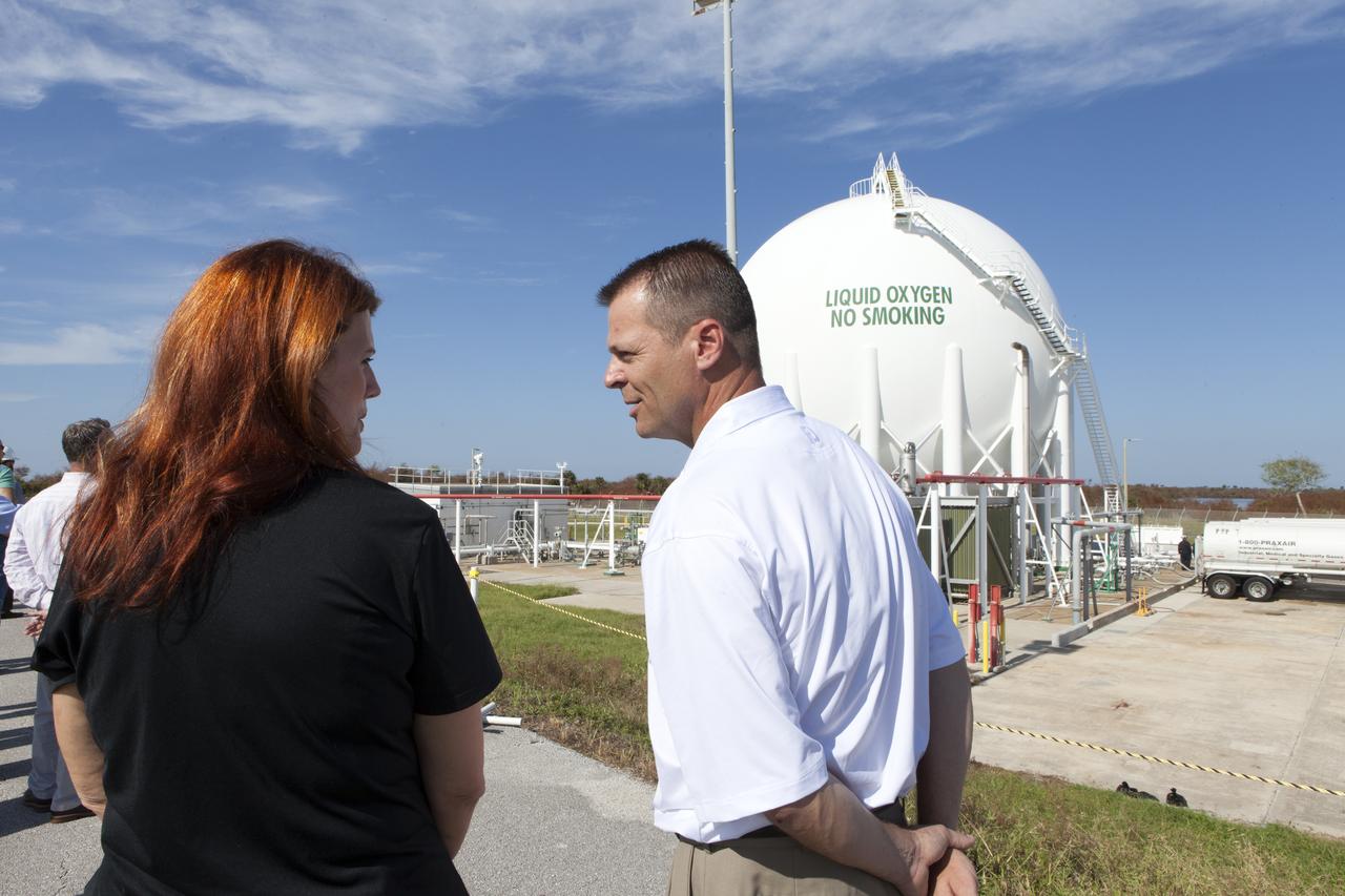 NASA Launch Director Charlie Blackwell-Thompson, at left, arrives at Launch Pad 39B at NASA's Kennedy Space Center in Florida, to observe the first major tanking operation of liquid oxygen, or LO2, into the giant storage sphere at the northwest corner of the pad to prepare for the launch of the agency's Orion spacecraft atop the Space Launch System (SLS) rocket. During the operation, several Praxair trucks will slowly offload LO2 to gradually chill down the sphere from normal temperature to about negative 298 degrees Fahrenheit. The Ground Systems Development and Operations Program is overseeing upgrades and modifications to pad B to support the launch of the SLS and Orion spacecraft for Exploration Mission-1, deep space missions and NASA’s journey to Mars.