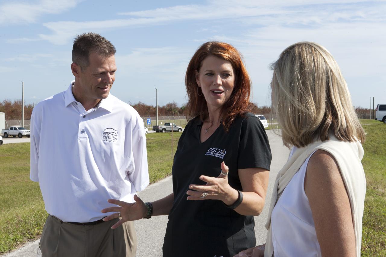NASA Launch Director Charlie Blackwell-Thompson, center, talks to engineers at Launch Pad 39B at the agency's Kennedy Space Center in Florida. Blackwell-Thompson will observe the first major tanking operation of liquid oxygen, or LO2, into the giant storage sphere at the northwest corner of the pad to prepare for the launch of the agency's Orion spacecraft atop the Space Launch System (SLS) rocket. During the operation, several Praxair trucks will slowly offload LO2 to gradually chill down the sphere from normal temperature to about negative 298 degrees Fahrenheit. The Ground Systems Development and Operations Program is overseeing upgrades and modifications to pad B to support the launch of the SLS and Orion spacecraft for Exploration Mission-1, deep space missions and NASA’s journey to Mars.