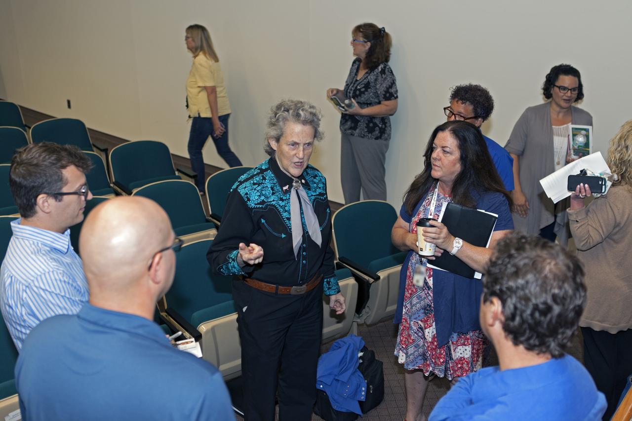 Dr. Temple Grandin speaks with employees following Kennedy Space Center's annual National Disability Employment Awareness Month (NDEAM) event. Grandin served as keynote speaker. A prominent author and speaker on animal behavior and autism, she is a professor of animal science at Colorado State University in Fort Collins, Colorado. Kennedy's Disability Awareness and Action Working Group partnered with the Kennedy Networking Opportunities for Women group to sponsor the presentation.