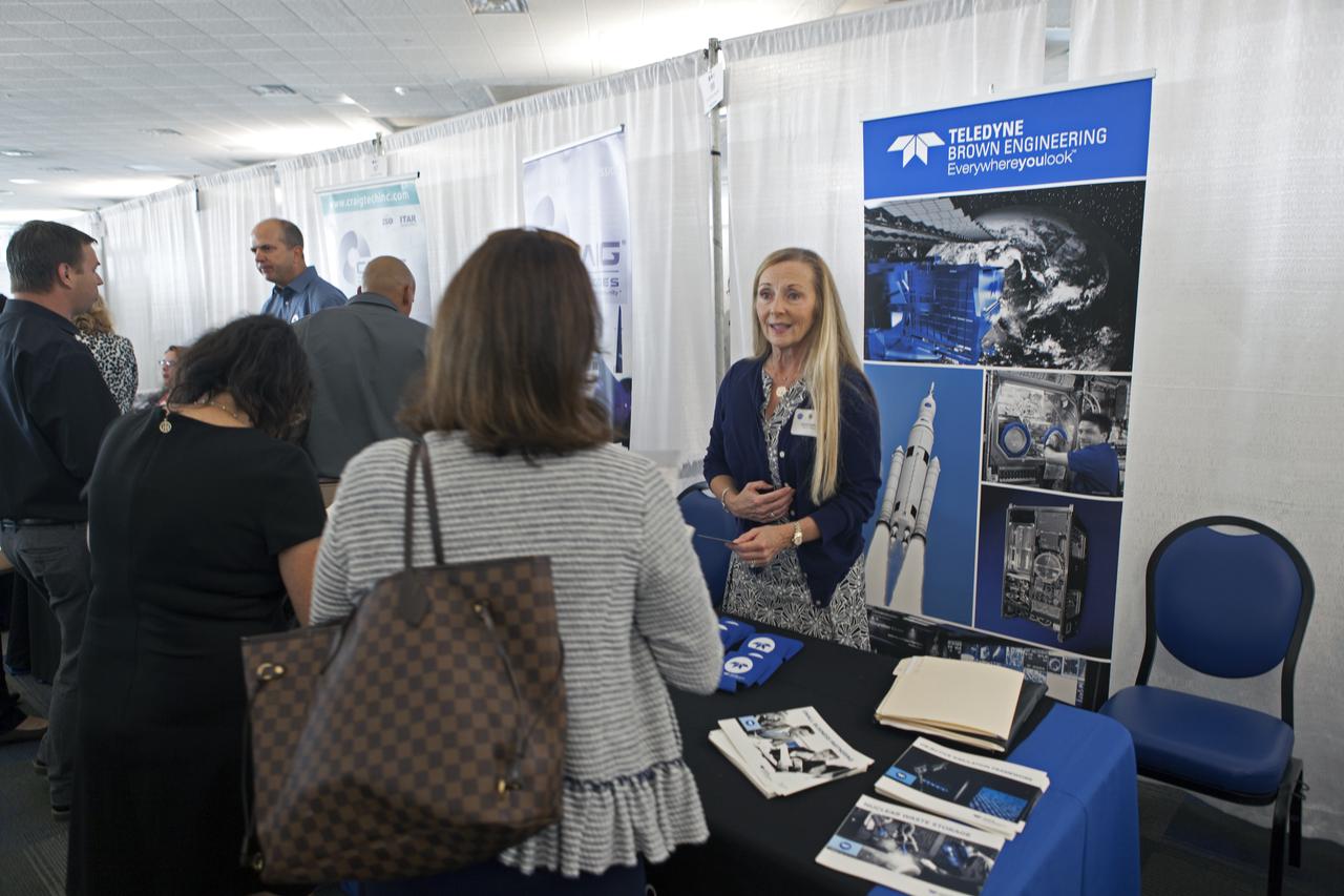 Exhibitors answer questions at Kennedy Space Center's 27th Business Opportunities Expo held at Cruise Terminal 5 at Port Canaveral in Florida. The event featured more than 180 businesses, large and small, and government exhibitors from throughout the Space Coast and the nation. The Business Opportunities Expo is sponsored by the NASA KSC Prime Contractor Board, KSC Industry Assistance Office, 45th Space Wing and Canaveral Port Authority. Exhibitors included vendors from a variety of product and service areas, such as computer technology, engineering services, communication equipment and services, and construction and safety products, to name a few. Representatives from the 45th Space Wing, KSC prime contractors, NASA and many more agencies and organizations were on hand to provide information and answer questions. 