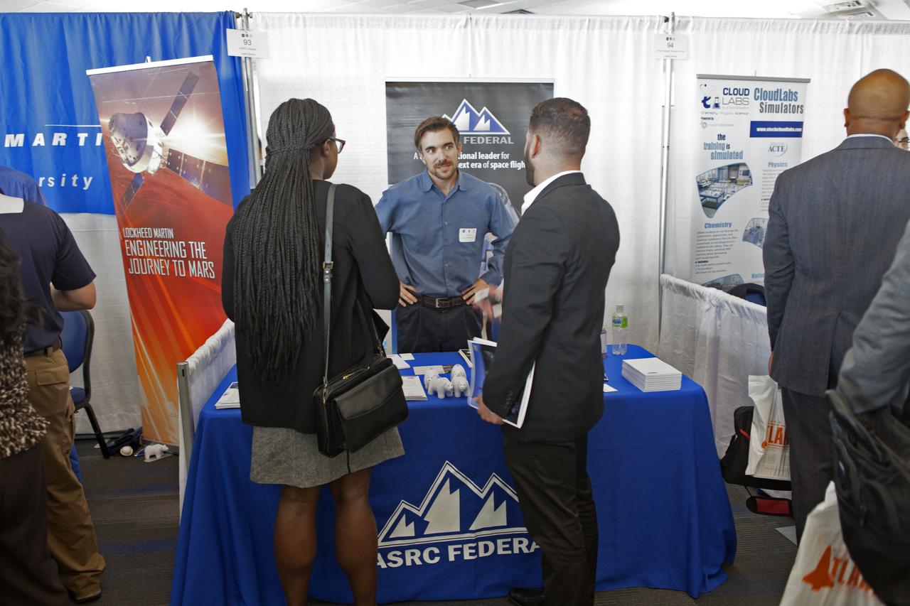 An exhibitor answers questions at Kennedy Space Center's 27th Business Opportunities Expo held at Cruise Terminal 5 at Port Canaveral in Florida. The event featured more than 180 businesses, large and small, and government exhibitors from throughout the Space Coast and the nation. The Business Opportunities Expo is sponsored by the NASA KSC Prime Contractor Board, KSC Industry Assistance Office, 45th Space Wing and Canaveral Port Authority. Exhibitors included vendors from a variety of product and service areas, such as computer technology, engineering services, communication equipment and services, and construction and safety products, to name a few. Representatives from the 45th Space Wing, KSC prime contractors, NASA and many more agencies and organizations were on hand to provide information and answer questions.