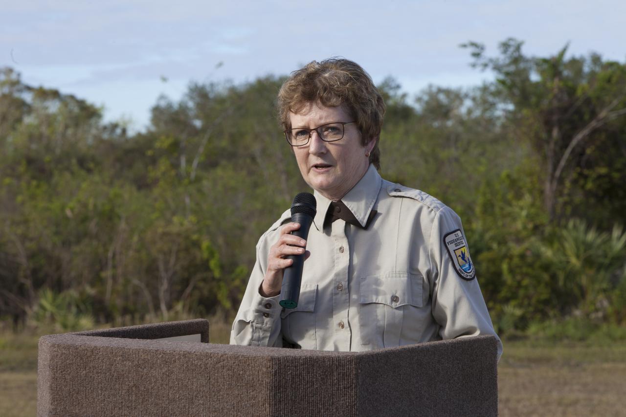 Layne Hamilton, manager of the Merritt Island National Wildlife Refuge, welcomes guests to a ceremony held Nov. 1 on the refuge in Florida. During the joint ceremony, the Spaceport Integration Team and its partners were presented with the prestigious 2017 Pulaski Award and a new memorial marker was dedicated. The multi-agency team includes representatives from NASA's Kennedy Space Center, Cape Canaveral Air Force Station's 45th Space Wing, the Merritt Island National Wildlife Refuge, as well as the Florida Forest Service and Brevard County Fire Rescue. The memorial marker honors two fallen firefighters, Scott Maness and Beau Sauselein, who died fighting a wildfire on space center property in 1981. Held outdoors, the ceremony was attended by 140 guests.