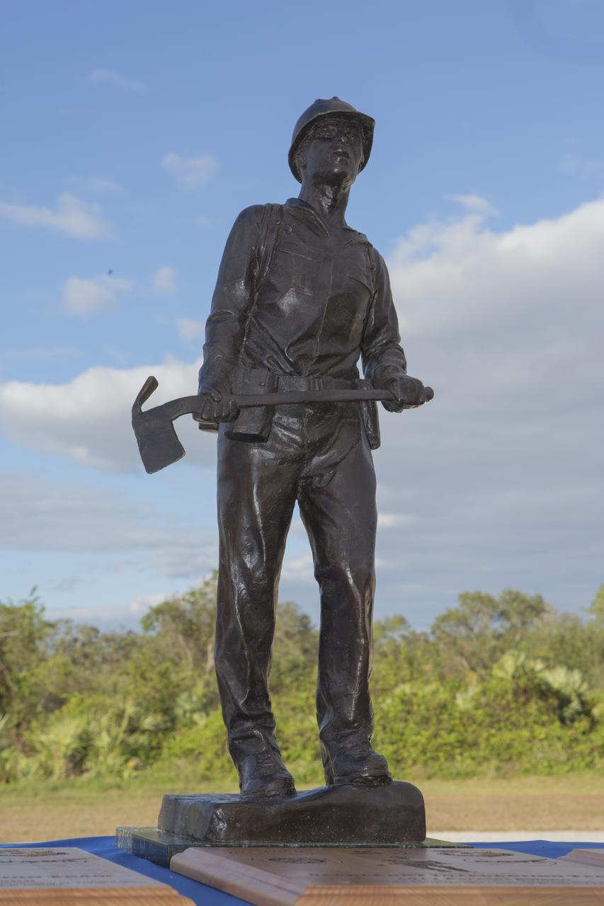 The prestigious 2017 Pulaski Award is on display near a new memorial marker on the Merritt Island National Wildlife Refuge in Florida. During a joint ceremony, the Spaceport Integration Team and its partners were presented with the award and a new memorial marker was dedicated. The multi-agency team includes representatives from NASA's Kennedy Space Center, Cape Canaveral Air Force Station's 45th Space Wing, the Merritt Island National Wildlife Refuge, as well as the Florida Forest Service and Brevard County Fire Rescue. The memorial marker honors two fallen firefighters, Scott Maness and Beau Sauselein, who died fighting a wildfire on space center property in 1981. Held outdoors, the ceremony was attended by 140 guests.