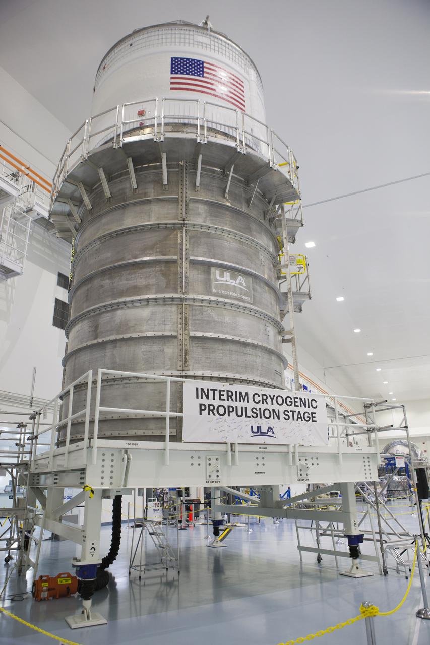 Packed inside its canister, the Interim Cryogenic Propulsion Stage (ICPS) stands inside the high bay of the Space Station Processing Facility at NASA's Kennedy Space Center in Florida. The ICPS is the first integrated piece of flight hardware to arrive in preparation for the uncrewed Exploration Mission-1. With the Orion attached, the ICPS sits atop the SLS rocket and will provide the spacecraft with the additional thrust needed to travel tens of thousands of miles beyond the Moon.