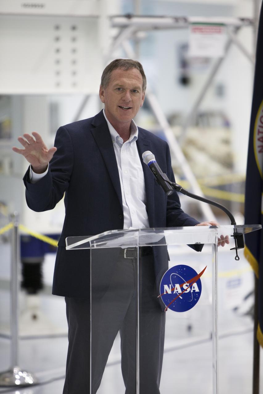 Mike Bolger, Ground Systems Development and Operations Program manager at NASA's Kennedy Space Center, speaks to guests during a ceremony in the high bay of the Space Station Processing Facility. The event marked the milestone of the Space Launch System rocket's Interim Cryogenic Propulsion Stage (ICPS) being turned over from NASA's Spacecraft/Payload Integration and Evolution organization to the spaceport's Ground Systems Development and Operations directorate. The ICPS is the first integrated piece of flight hardware to arrive in preparation for the uncrewed Exploration Mission-1.