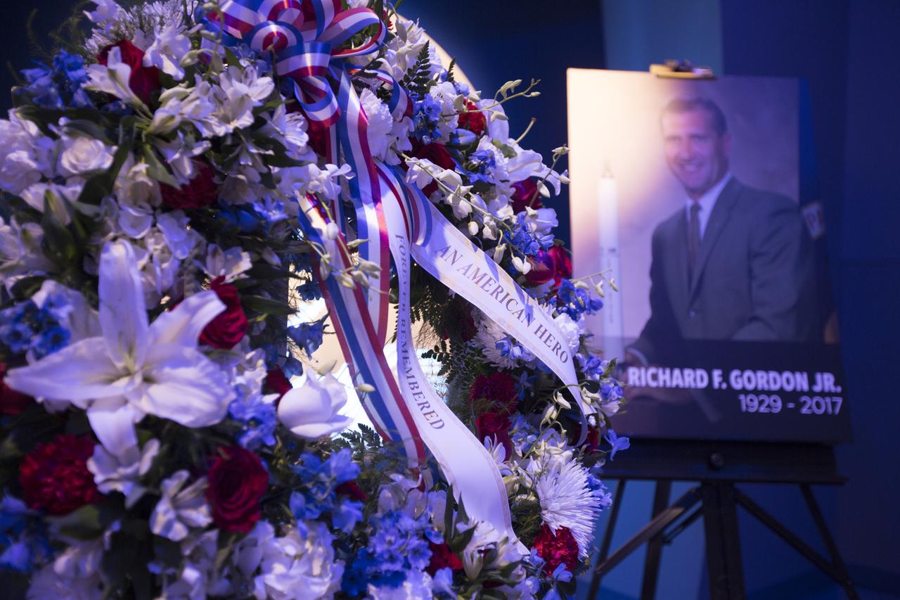 In the Heroes and Legends exhibit at the Kennedy Space Center Visitor Complex, a memorial wreath was placed following a ceremony to honor the memory of former NASA astronaut Richard Gordon. He performed two spacewalks during Gemini XI in 1966 and was command module pilot on Apollo 12 in 1969. Gordon died Nov. 6, 2017, at the age of 88.