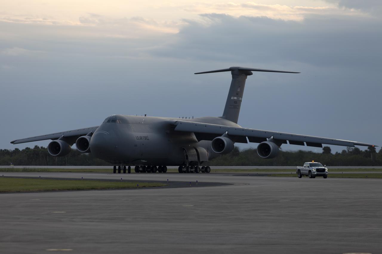 A C-5 transport aircraft arrives at the Shuttle Landing Facility at NASA's Kennedy Space Center in Florida, carrying the Geostationary Operation Environmental Satellite-S (GOES-S). The satellite will be offloaded and transported to the Astrotech Space Operations facility in Titusville, Florida. GOES-S is the second in a series of four advanced geostationary weather satellites. The GOES-R series - consisting of the GOES-R, GOES-S, GOES-T and GOES-U spacecraft - will significantly improve the detection and observation of environmental phenomena that directly affect public safety, protection of property and the nation's economic health and prosperity. GOES-S is slated to launch March 1, 2018 aboard a United Launch Alliance Atlas V rocket from Cape Canaveral Air Force Station in Florida.