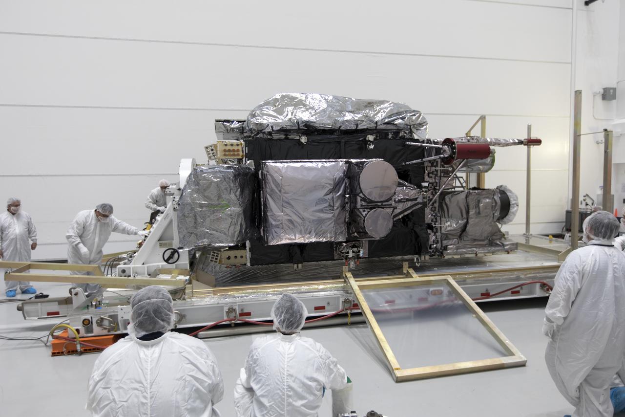 At Astrotech Space Operations in Titusville, Florida, technician and engineers inspect NOAA's Geostationary Operational Environmental Satellite-S (GOES-S) after it was uncrated from its shipping container. The facility is located near NASA's Kennedy Space Center. GOES-S is the second in a series of four advanced geostationary weather satellites. The GOES-R series - consisting of the GOES-R, GOES-S, GOES-T and GOES-U spacecraft - will significantly improve the detection and observation of environmental phenomena that directly affect public safety, protection of property and the nation's economic health and prosperity. GOES-S is slated to launch March 1, 2018 aboard a United Launch Alliance Atlas V rocket from Cape Canaveral Air Force Station in Florida. 