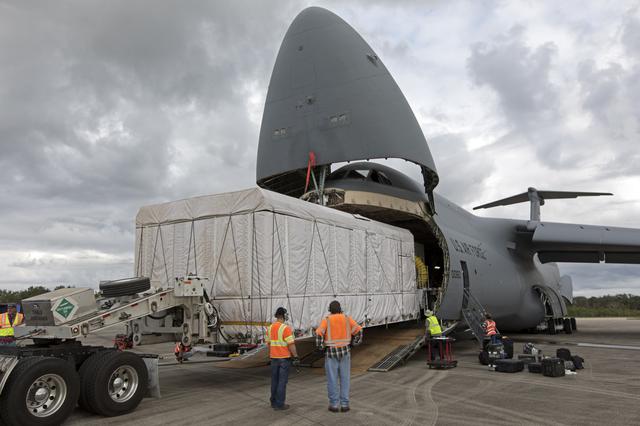 NASA image: GOES-S Offload from C-5 Aircraft