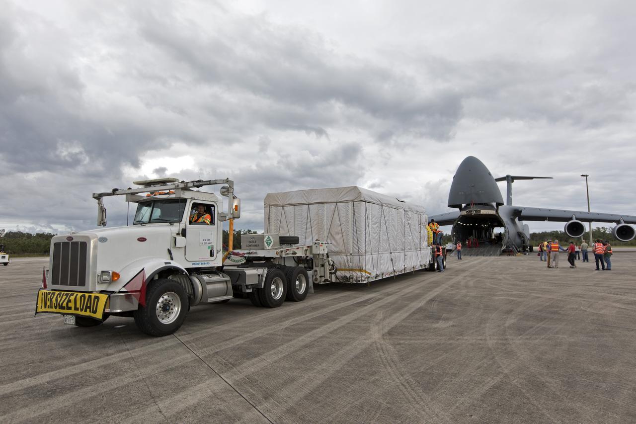 NOAA's Geostationary Operation Environmental Satellite-S (GOES-S) has been offloaded from a C-5 transport aircraft and secured onto the flatbed of a heavy-lift truck at the Shuttle Landing Facility at NASA's Kennedy Space Center in Florida. The satellite will be transported to the Astrotech Space Operations facility in Titusville, Florida to prepare it for launch. GOES-S is the second in a series of four advanced geostationary weather satellites. The GOES-R series - consisting of the GOES-R, GOES-S, GOES-T and GOES-U spacecraft - will significantly improve the detection and observation of environmental phenomena that directly affect public safety, protection of property and the nation's economic health and prosperity. GOES-S is slated to launch March 1, 2018 aboard a United Launch Alliance Atlas V rocket from Cape Canaveral Air Force Station in Florida. 