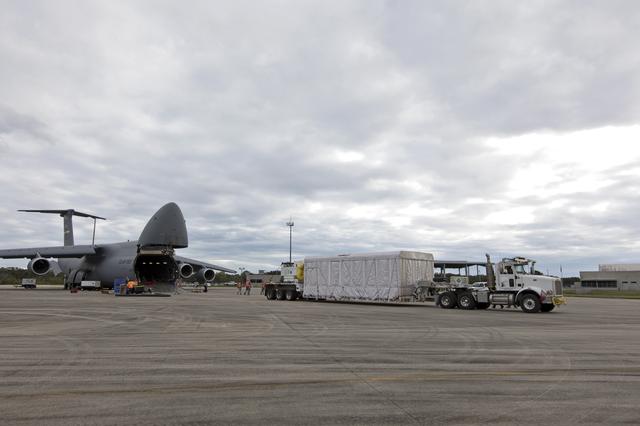 NASA image: GOES-S Offload from C-5 Aircraft
