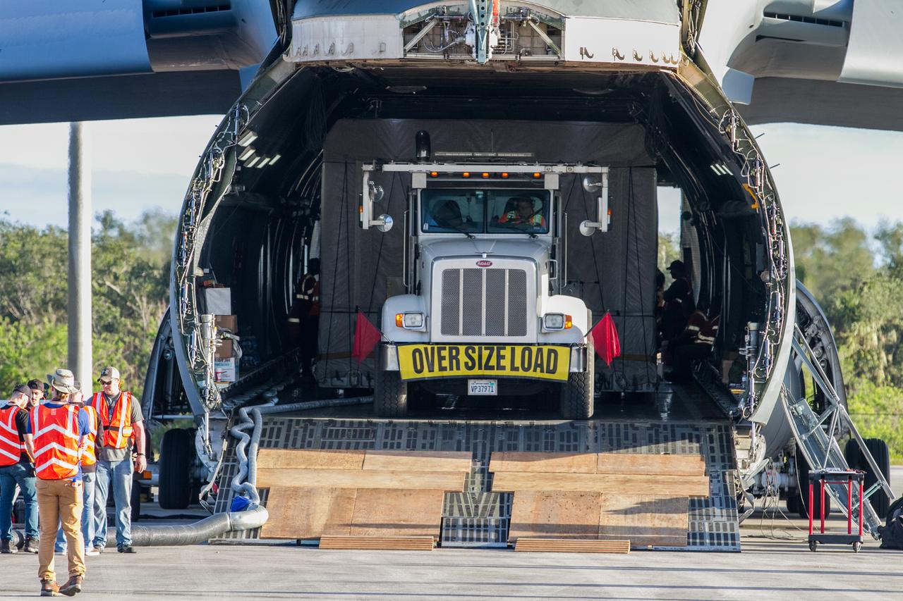 NOAA's Geostationary Operation Environmental Satellite-S (GOES-S) is being offloaded from a C-5 transport aircraft onto the flatbed of a heavy-lift truck at the Shuttle Landing Facility at NASA's Kennedy Space Center in Florida. The satellite will be transported to the Astrotech Space Operations facility in Titusville, Florida to prepare it for launch. GOES-S is the second in a series of four advanced geostationary weather satellites. The GOES-R series - consisting of the GOES-R, GOES-S, GOES-T and GOES-U spacecraft - will significantly improve the detection and observation of environmental phenomena that directly affect public safety, protection of property and the nation's economic health and prosperity. GOES-S is slated to launch March 1, 2018 aboard a United Launch Alliance Atlas V rocket from Cape Canaveral Air Force Station in Florida.