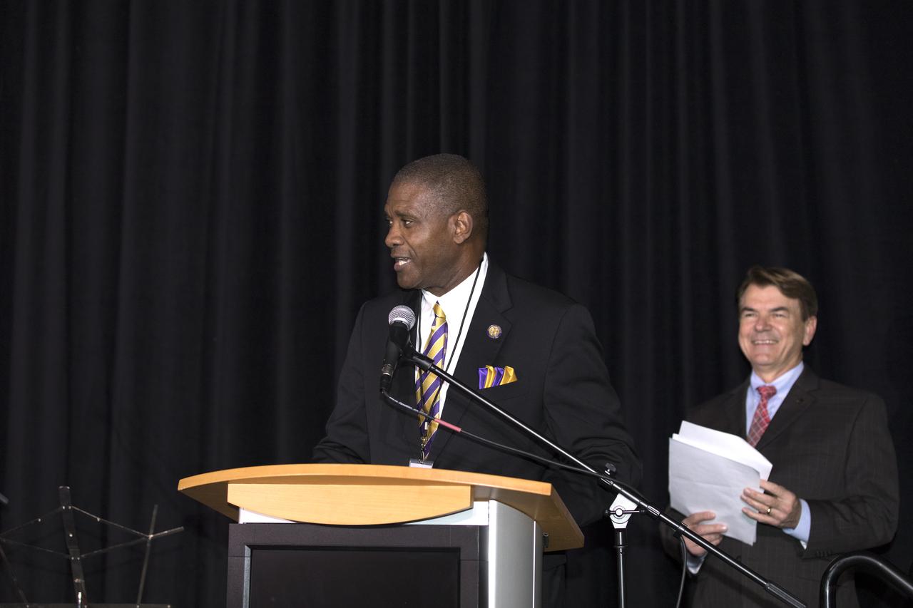 Former Florida State Sen. Tony Hill speaks during an Astronauts Memorial Foundation tribute honoring U.S. Air Foce Maj. Robert Lawrence. Looking on is State Rep. Thad Altman, president of the AMF. Selected in 1967 for the Manned Orbiting Laboratory Program, Lawrence was the first African-American astronaut. He lost his life in a training accident 50 years ago. The ceremony took place in the Center for Space Education at the Kennedy Space Center Visitor Complex.
