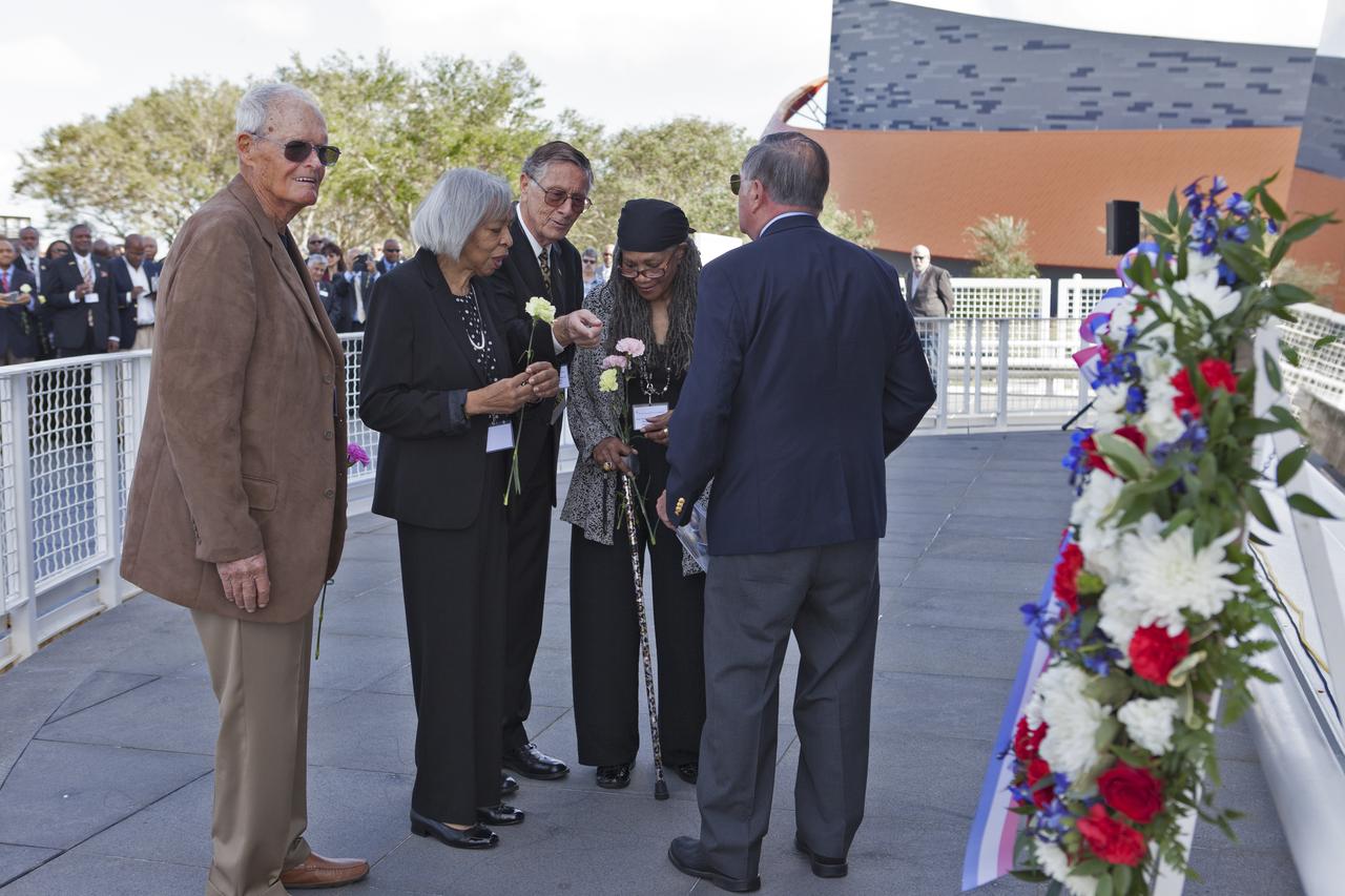 During an Astronauts Memorial Foundation tribute honoring U.S. Air Foce Maj. Robert Lawrence, a wreath is placed at the Space Mirror Memorial at the Kenendy Space Center Visitor Compelx. Participating are, from thje left, Al Crews, Lawrence's sister, Barbara Lawrence, Ph.D., James Abrahamson, Lawrence's sister-in-law Lorne Cress Love, and Bob Crippen. Crews, Abrahamson and Crippen all were selected as astronauts for the Manned Orbiting Laboratory (MOL) Program. Selected in 1967 for MOL, Lawrence was the first African-American astronaut. He lost his life in a training accident 50 years ago. The ceremony took place in the Center for Space Education at the Kennedy Space Center Visitor Complex.