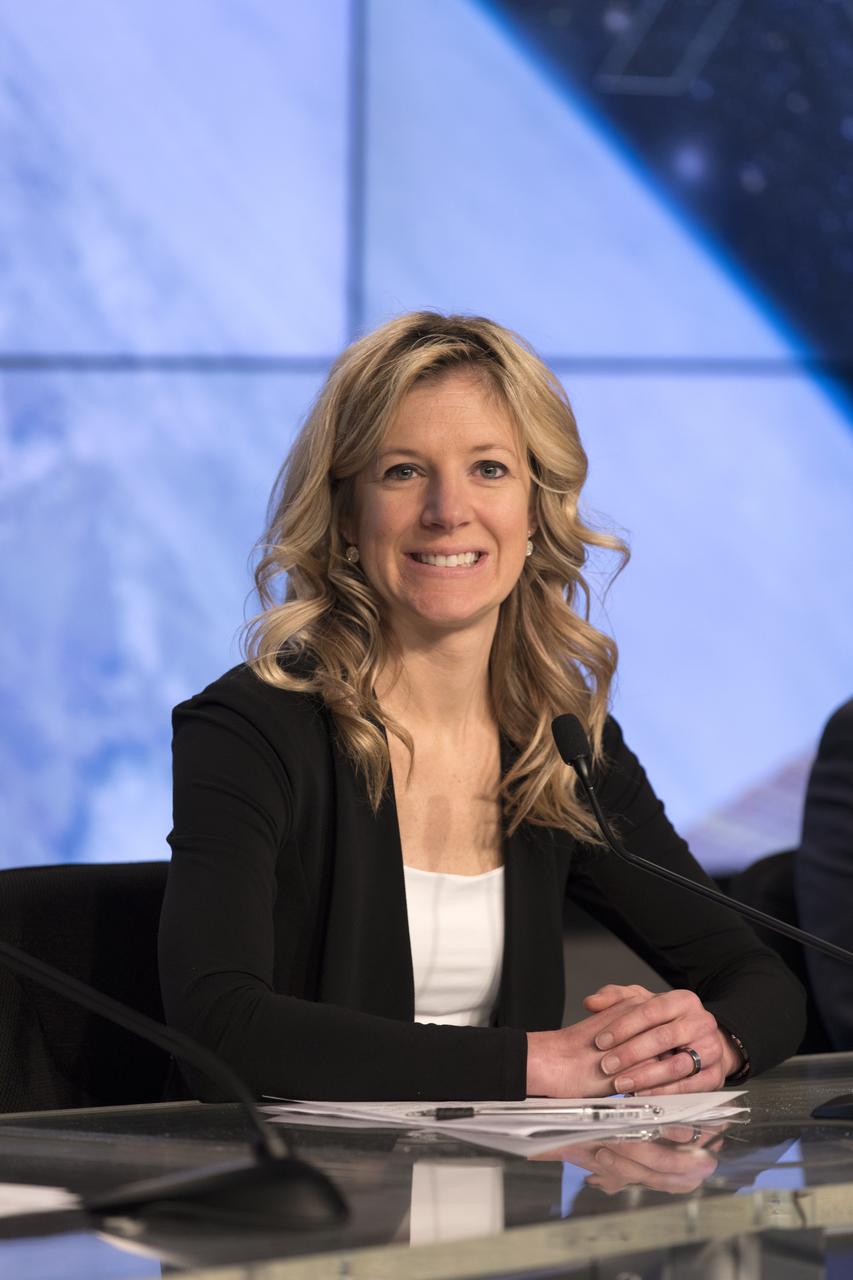 In the Kennedy Space Center’s Press Site auditorium, Jessica Jensen, SpaceX director of Dragon Mission Management, speaks to members of the media during a prelaunch news conference for the SpaceX CRS-13 commercial resupply services mission to the International Space Station. A Dragon spacecraft is scheduled to be launched from Space Launch Complex 40 at Cape Canaveral Air Force Station at 11:46 a.m. EST, on Dec. 12, 2017. The SpaceX Falcon 9 rocket will lift off on the company's 13th Commercial Resupply Services mission to the space station.
