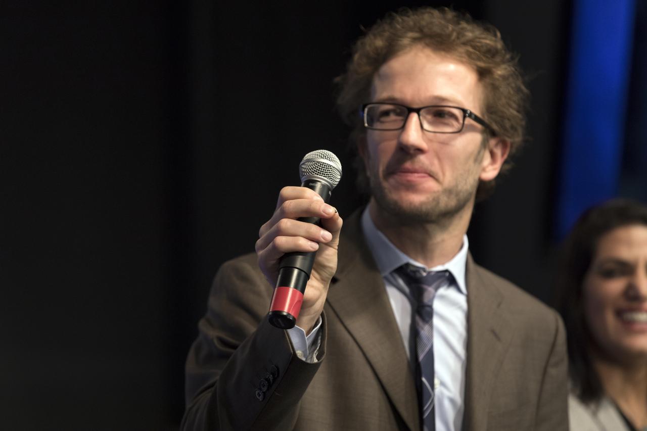 In the Kennedy Space Center’s Press Site auditorium, Alessandro Grattoni, principal investigator at Houston Methodist Research Institute, shows the small hardware to be tested during an investigation into a drug delivery systems for combatting muscle breakdown in microgravity. The briefing focused on research planned for launch to the International Space Station. The scientific materials and supplies will be aboard a Dragon spacecraft scheduled for liftoff from Cape Canaveral Air Force Station's Space Launch Complex 40 at 11:46 a.m. EST, on Dec. 12, 2017. The SpaceX Falcon 9 rocket will launch the company's 13th Commercial Resupply Services mission to the space station.