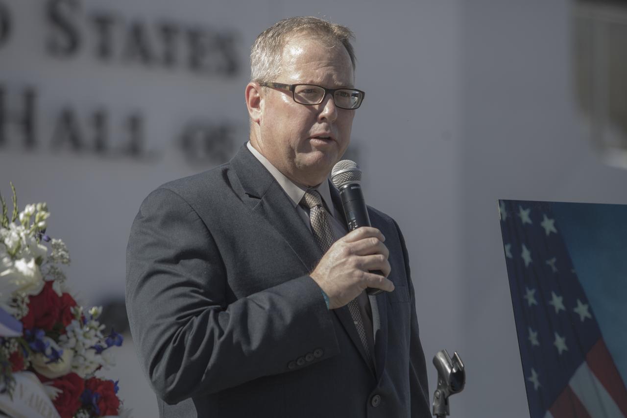 Delaware North COO Therrin Protze speaks during a ceremony at the Heroes and Legends exhibit at the Kennedy Space Center Visitor Complex. The brief memorial honoring NASA astronaut John Young took place on the afternoon of Jan. 11, 2018. Young died Jan. 5, 2018, in Houston at the age of 87. He was the only astronaut to fly in NASA's Gemini, Apollo and Space Shuttle Programs.