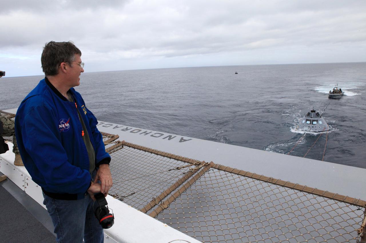 NASA astronaut Stephen Bowen gets a birds-eye view of the rough seas during part of Underway Recovery Test 6. Bowen is watching the testing so he can provide the team with an astronaut’s perspective. The testing with Kennedy Space Center's NASA Recovery Team and the U.S. Navy will provide important data that is being used to improve recovery procedures and hardware ahead of Orion's next flight, Exploration Mission-1, when it splashes down in the Pacific Ocean.