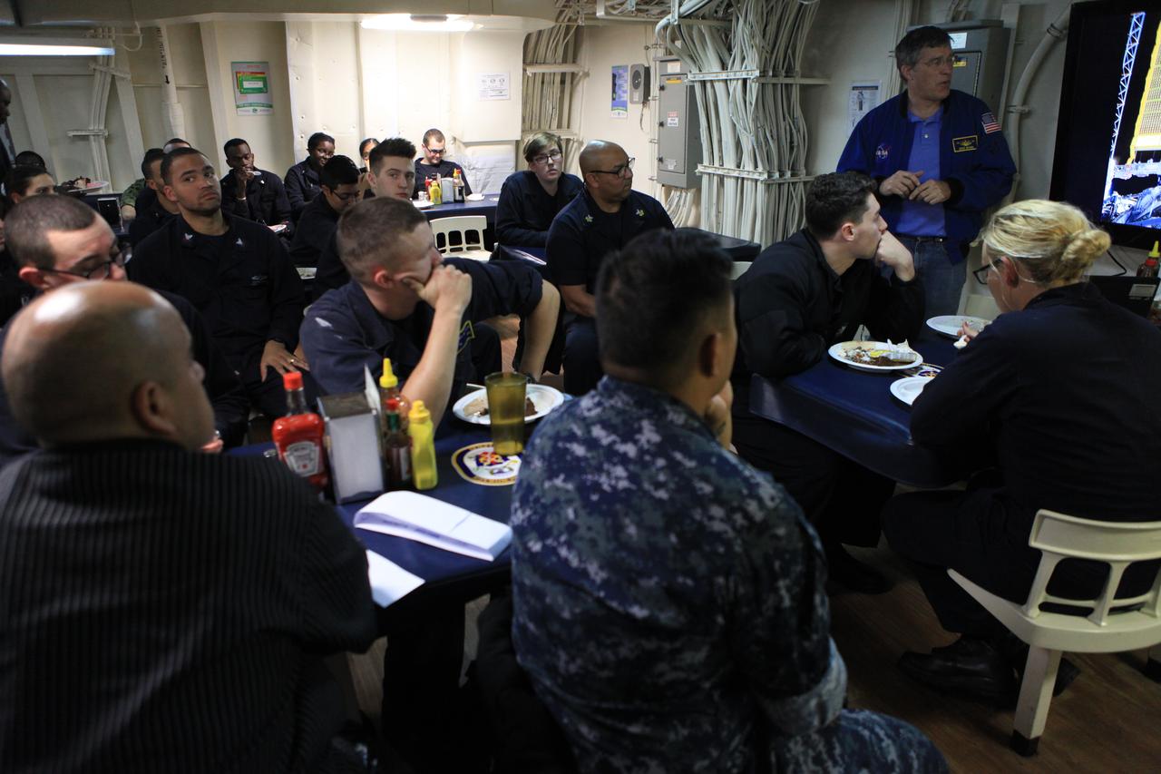During Underway Recovery Test 6, NASA astronaut Stephen Bowen talks with sailors about the correlations between his Navy and NASA experiences. Bowen is aboard USS Anchorage as Kennedy Space Center’s NASA Recovery Team works with the U.S. Navy to improve recovery procedures and hardware ahead of Orion's next flight, Exploration Mission-1, when it splashes down in the Pacific Ocean.