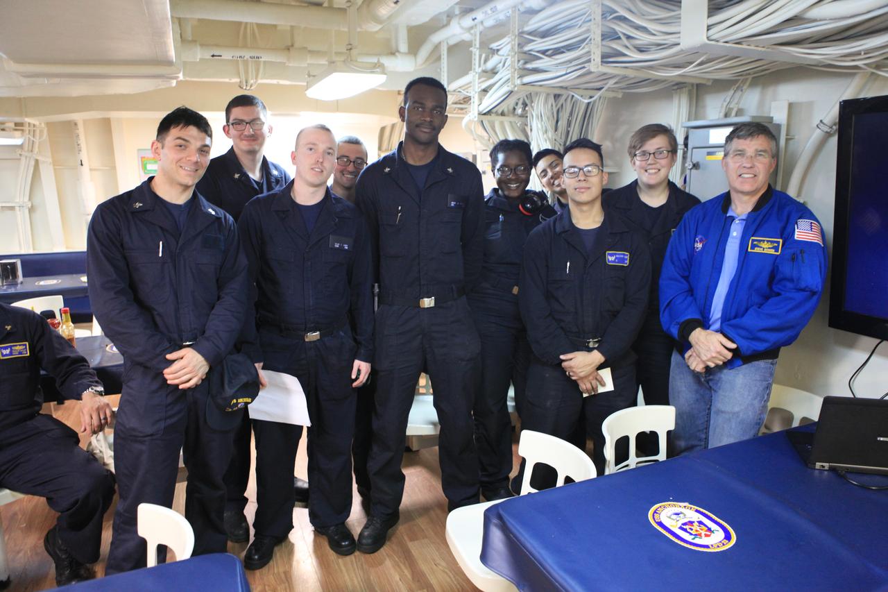 During Underway Recovery Test 6, NASA astronaut Stephen Bowen talks with sailors about the correlations between his Navy and NASA experiences. Bowen is aboard USS Anchorage as Kennedy Space Center’s NASA Recovery Team works with  the U.S. Navy to improve recovery procedures and hardware ahead of Orion's next flight, Exploration Mission-1, when it splashes down in the Pacific Ocean.