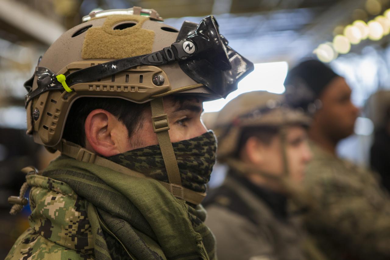 Navy Diver 2nd Class Laethem and his fellow divers get briefed before heading out to sea to recover the Orion test article during Underway Recovery Test 6 off the coast of San Diego. Kennedy Space Center’s NASA Recovery Team works with the U.S. Navy to improve recovery procedures and hardware ahead of Orion's next flight, Exploration Mission-1, when it splashes down in the Pacific Ocean.