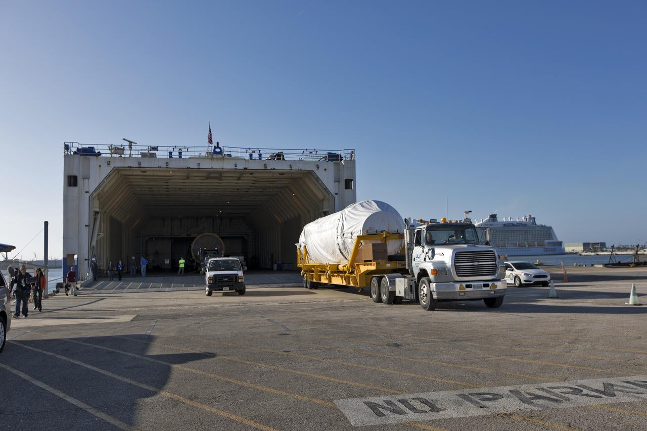 The United Launch Alliance Atlas V booster and Centaur stage for NOAA's Geostationary Operational Environmental Satellite-S (GOES-S) are offloaded from the Mariner transport ship at the Army Wharf at Cape Canaveral Air Force Station in Florida. They will be transported to the Atlas Spaceflight Operations Center near Space Launch Complex 41 at CCAFS. GOES-S is the second in a series of four advanced geostationary weather satellites. The satellite is slated to launch aboard the Atlas V rocket March 1.