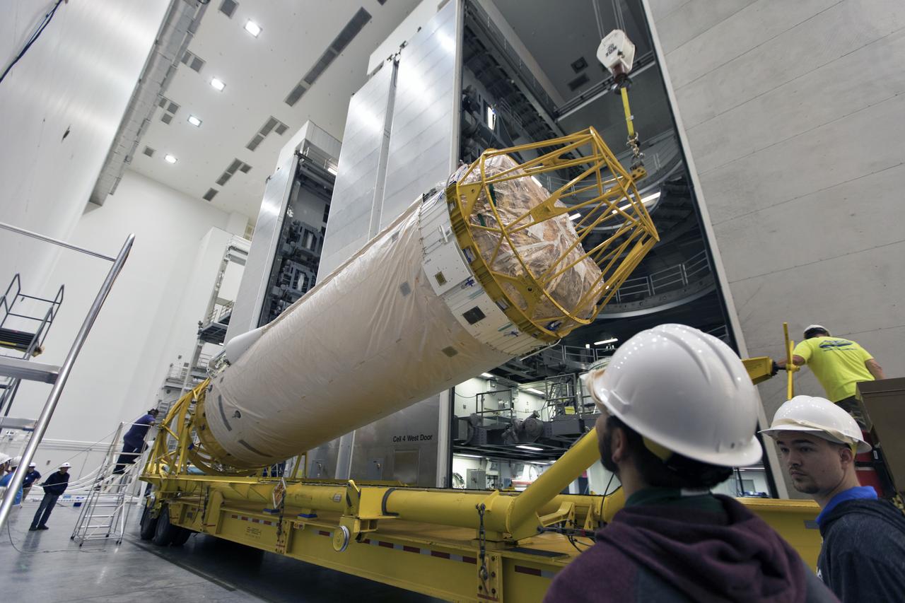 Under the watchful eyes of technicians and engineers, the Centaur upper stage that will help launch NOAA's Geostationary Operational Environmental Satellite-S, or GOES-S, is lifted from its transporter inside the Delta Operations Center at Cape Canaveral Air Force Station for further processing. GOES-S is the second in a series of four advanced geostationary weather satellites. The GOES-R series - consisting of the GOES-R, GOES-S, GOES-T and GOES-U spacecraft - will significantly improve the detection and observation of environmental phenomena that directly affect public safety, protection of property and the nation's economic health and prosperity. GOES-S is slated to launch March 1, 2018 aboard a United Launch Alliance Atlas V rocket.