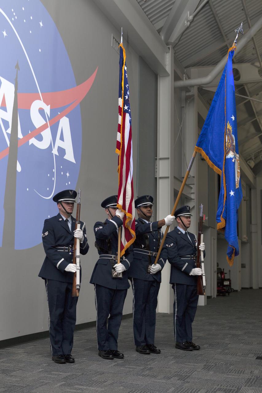 The Patrick Air Force Base color guard presents the colors during the playing of the national anthem during this year's Day of Remembrance ceremony at the Kennedy Space Center Visitor Complex. Each year spaceport employees and guests join others throughout NASA honoring the contributions of astronauts who have perished in the conquest of space.