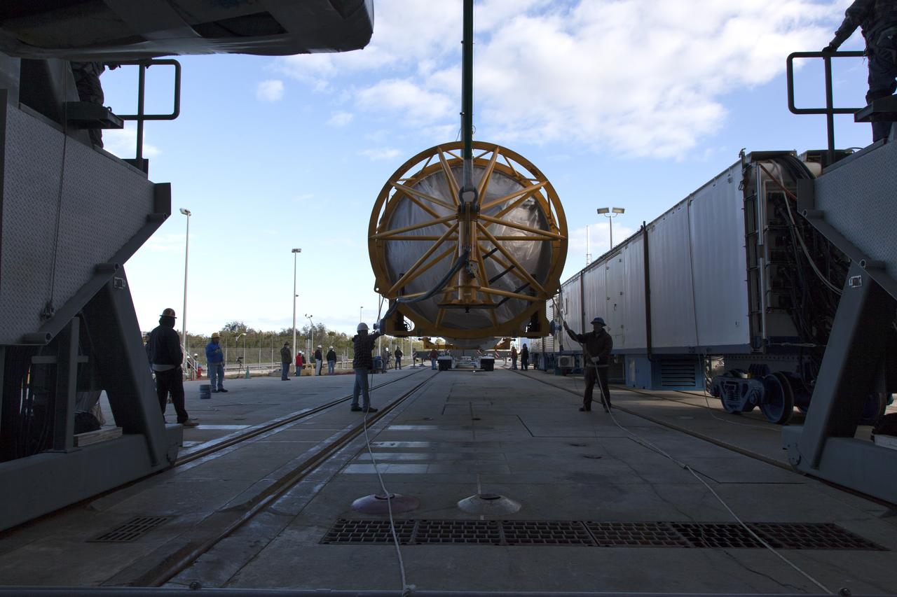 A crane lifts a United Launch Alliance Atlas V first stage at the Vertical Integration Facility at Space Launch Complex 41 at Cape Canaveral Air Force Station in Florida. The rocket will be positioned on its launcher to boost the Geostationary Operational Environmental Satellite, or GOES-S. It will be the second in a series of four advanced geostationary weather satellites and will significantly improve the detection and observation of environmental phenomena that directly affect public safety. GOES-S is slated to launch March 1, 2018.