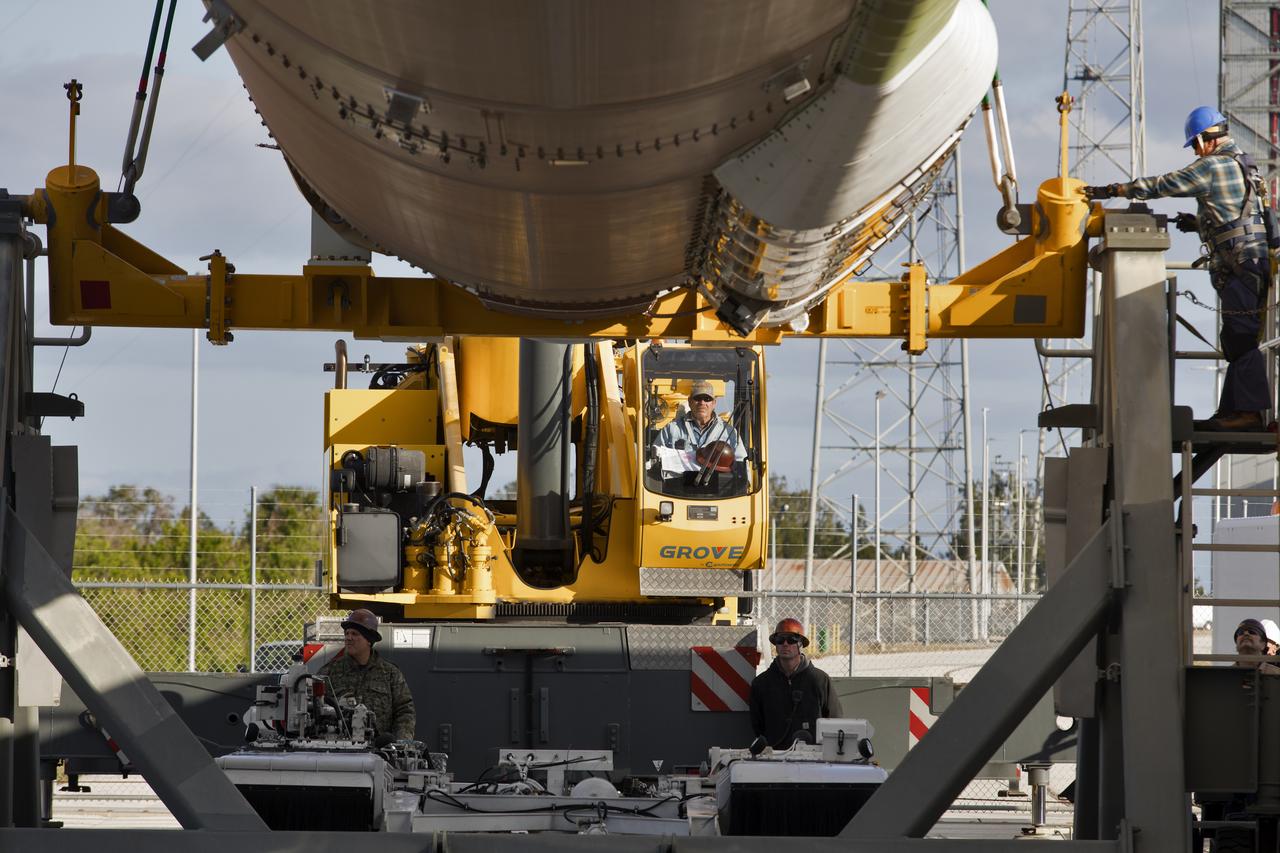 A crane lifts a United Launch Alliance Atlas V first stage at the Vertical Integration Facility at Space Launch Complex 41 at Cape Canaveral Air Force Station in Florida. The rocket will be positioned on its launcher to boost the Geostationary Operational Environmental Satellite, or GOES-S. It will be the second in a series of four advanced geostationary weather satellites and will significantly improve the detection and observation of environmental phenomena that directly affect public safety. GOES-S is slated to launch March 1, 2018.