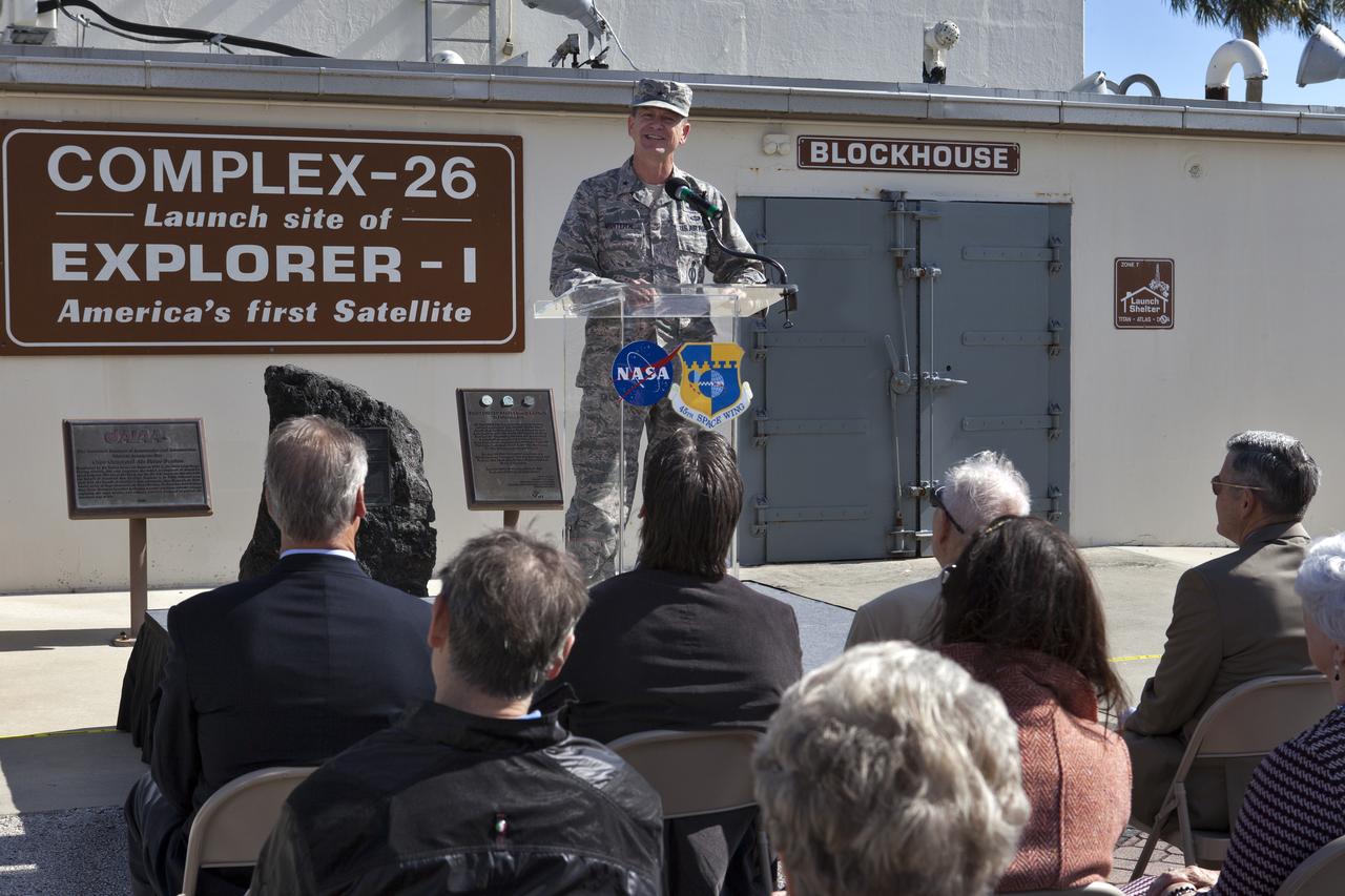 Brig. Gen. Wayne Monteith, 45th Space Wing commander and director of the Eastern Range, speaks to guests at an event celebrating the 60th anniversary of America's first satellite. The ceremony took place in front of the Space Launch Complex 26 blockhouse at Cape Canaveral Air Force Station where the Explorer 1 satellite was launched atop a Jupiter C rocket on Jan. 31, 1958. During operation, the satellite's cosmic ray detector discovered radiation belts around Earth which were named for Dr. James Van Allen, principal investigator for the satellite.