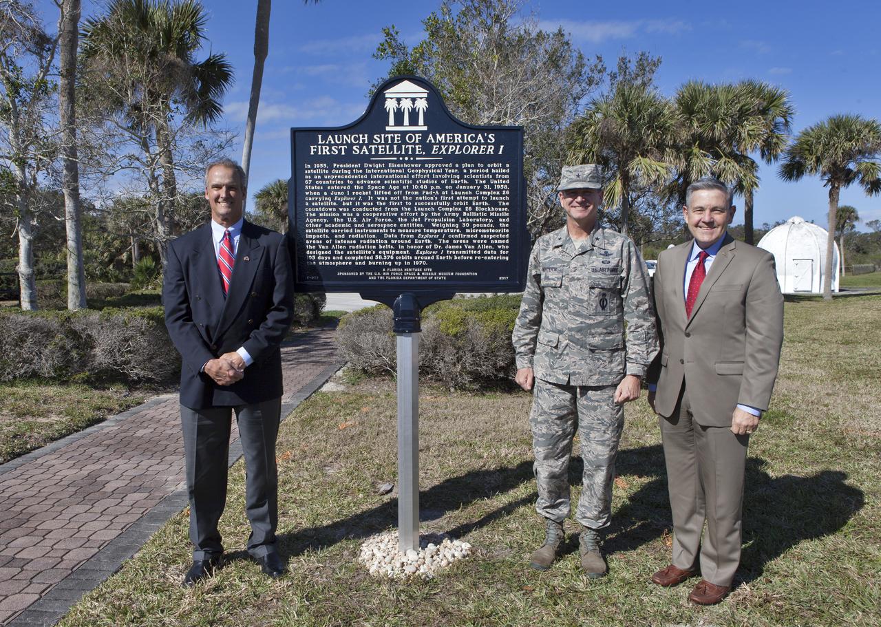 During a ceremony at Cape Canaveral Air Force Station's Space Launch Complex 26 a historical marker has been unveiled noting the launch of America's first satellite, Explorer 1. From the left, Ray Sands, chairman of the Air Force Space and Missile Foundation -- sponsor of the marker, Brig. Gen. Wayne Monteith, 45th Space Wing commander and director of the Eastern Range and Kennedy Space Center Director Bob Cabana. The Explorer 1 satellite was launched atop a Jupiter C rocket on Jan. 31, 1958. During operation, the satellite's cosmic ray detector discovered radiation belts around Earth which were named for Dr. James Van Allen, principal investigator for the satellite.
