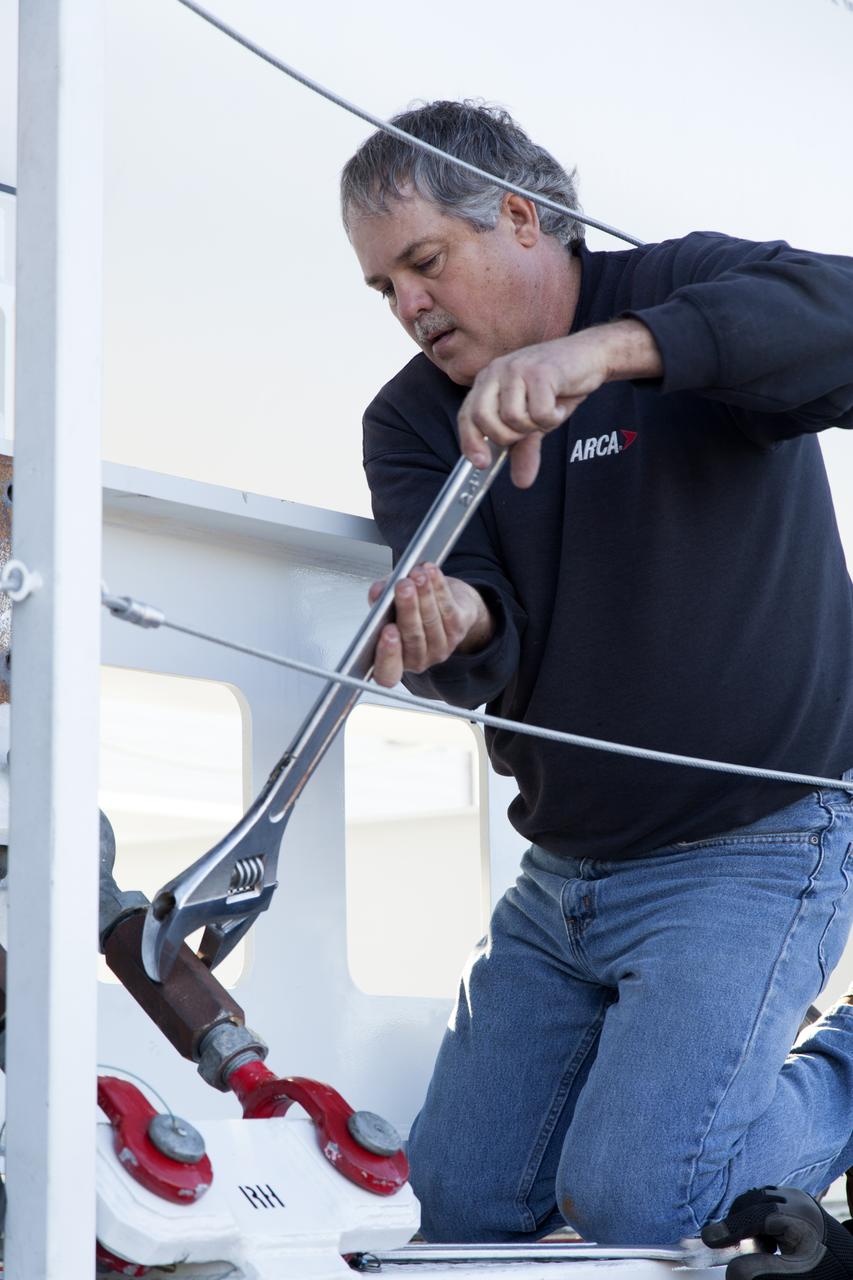 A technician prepares to offload a solid rocket booster (SRB) that just arrived at the Vertical Integration Facility at Space Launch Complex 41 at Cape Canaveral Air Force Station in Florida. The SRB will be mated to a United Launch Alliance Atlas V first stage to help boost NOAA's Geostationary Operational Environmental Satellite, or GOES-S, to orbit. GOES-S is the second in a series of four advanced geostationary weather satellites that will significantly improve the detection and observation of environmental phenomena that directly affect public safety, protection of property and the nation's economic health and prosperity. GOES-S is slated to launch March 1, 2018.