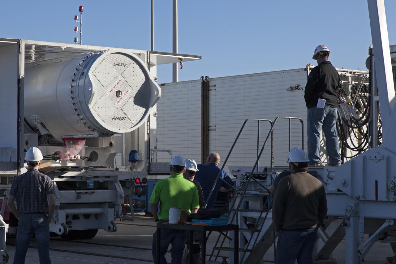 Technicians and engineers offload a solid rocket booster (SRB) that just arrived at the Vertical Integration Facility at Space Launch Complex 41 at Cape Canaveral Air Force Station in Florida. The SRB will be mated to a United Launch Alliance Atlas V first stage to help boost NOAA's Geostationary Operational Environmental Satellite, or GOES-S, to orbit. GOES-S is the second in a series of four advanced geostationary weather satellites that will significantly improve the detection and observation of environmental phenomena that directly affect public safety, protection of property and the nation's economic health and prosperity. GOES-S is slated to launch March 1, 2018.