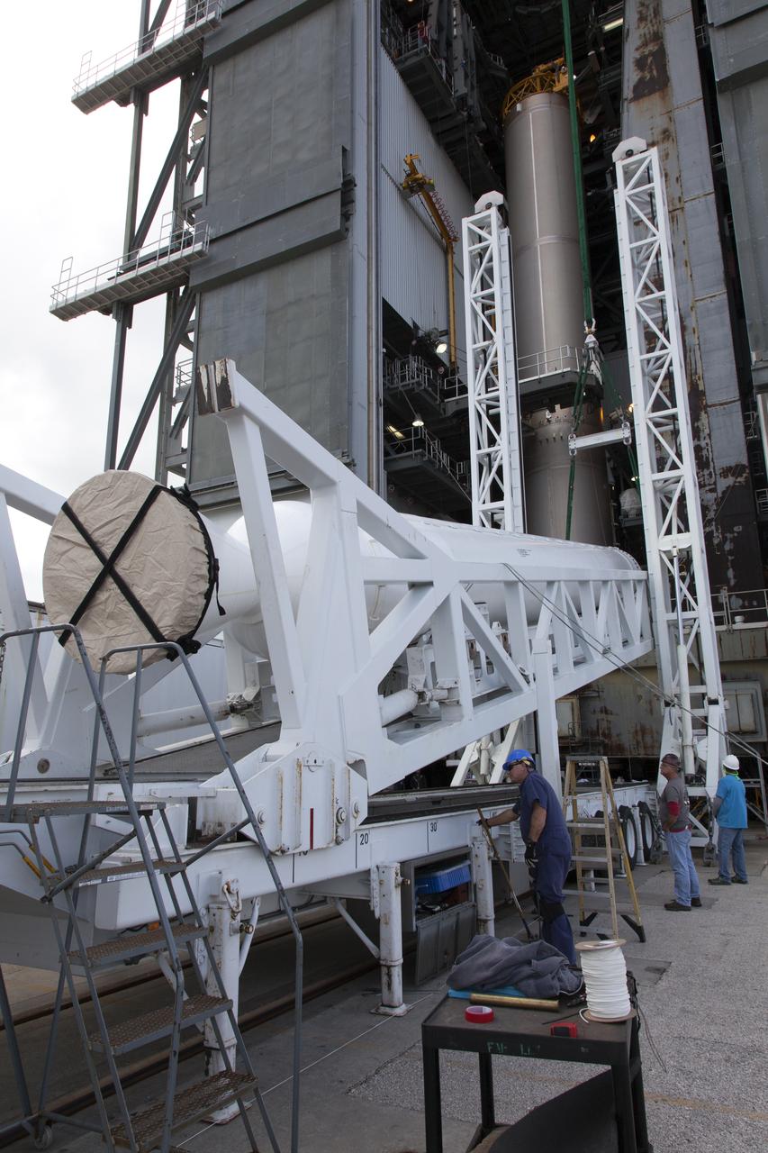 A solid rocket booster (SRB) is prepared for mating to a United Launch Alliance Atlas V first stage in the Vertical Integration Facility at Space Launch Complex 41 at Cape Canaveral Air Force Station in Florida. The SRB will be help boost NOAA's Geostationary Operational Environmental Satellite, or GOES-S, to orbit. GOES-S is the second in a series of four advanced geostationary weather satellites that will significantly improve the detection and observation of environmental phenomena that directly affect public safety, protection of property and the nation's economic health and prosperity. GOES-S is slated to launch March 1, 2018.