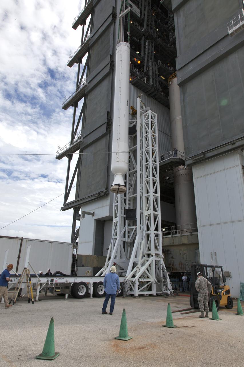 A crane lifts a solid rocket booster (SRB) for mating to a United Launch Alliance Atlas V first stage in the Vertical Integration Facility at Space Launch Complex 41 at Cape Canaveral Air Force Station in Florida. The SRB will be help boost NOAA's Geostationary Operational Environmental Satellite, or GOES-S, to orbit. GOES-S is the second in a series of four advanced geostationary weather satellites that will significantly improve the detection and observation of environmental phenomena that directly affect public safety, protection of property and the nation's economic health and prosperity. GOES-S is slated to launch March 1, 2018.