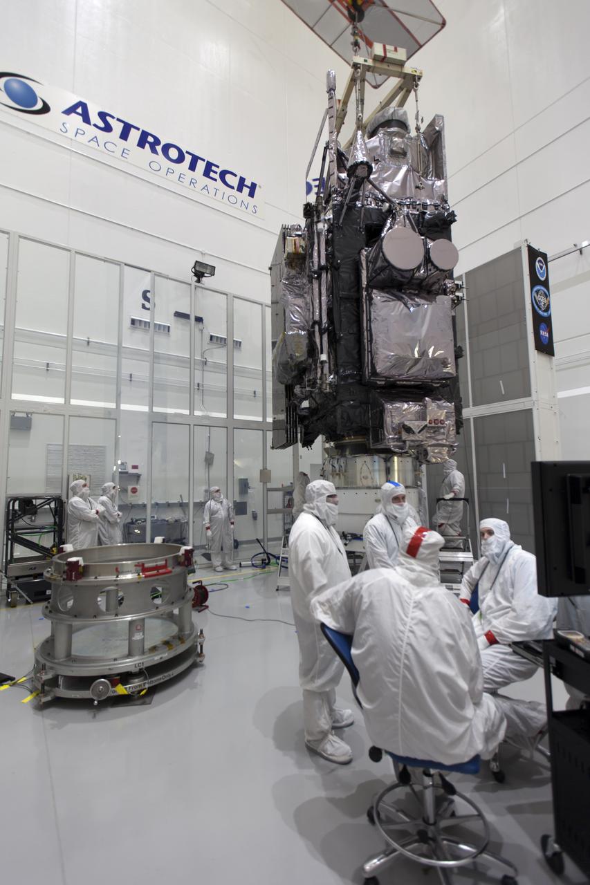 In a clean room at Astrotech Space Operations in Titusville, Florida, technicians and engineers monitor progress as NOAA's Geostationary Operational Environmental Satellite-S, or GOES-S, is mated to its payload attach fitting. It soon will be moved to Space Launch Complex 41 at Cape Canaveral Air Force Station for mounting atop the Atlas V rocket that will boost the satellite to orbit. GOES-S is the second in a series of four advanced geostationary weather satellites that will significantly improve the detection and observation of environmental phenomena that directly affect public safety, protection of property and the nation's economic health and prosperity. GOES-S is slated to launch March 1, 2018 aboard a United Launch Alliance Atlas V rocket.