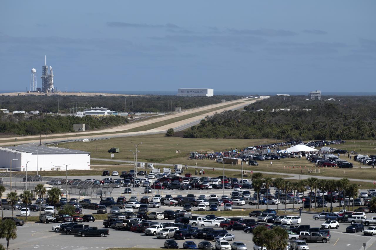 Employees, invited guests and members of the news media await liftoff of the SpaceX Falcon Heavy rocket from Launch Complex 39A at NASA’s Kennedy Space Center in Florida. The demonstration flight is a significant milestone for the world's premier multi-user spaceport. In 2014, NASA signed a property agreement with SpaceX for the use and operation of the center's pad 39A, where the company has launched Falcon 9 rockets and is preparing for the first Falcon Heavy. NASA also has Space Act Agreements in place with partners, such as SpaceX, to provide services needed to process and launch rockets and spacecraft. 