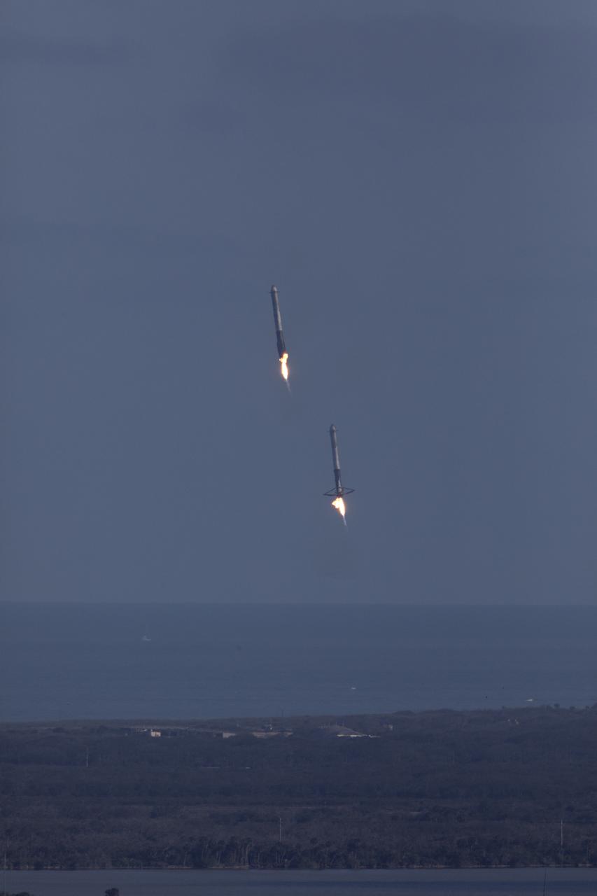 The SpaceX Falcon Heavy rocket’s two side cores descend toward landing at Cape Canaveral Air Force Station in Florida following a successful liftoff at 3:45 p.m. EST from Launch Complex 39A at NASA's Kennedy Space Center. This demonstration flight is a significant milestone for the world's premier multi-user spaceport. In 2014, NASA signed a property agreement with SpaceX for the use and operation of the center's pad 39A, where the company has launched Falcon 9 rockets and prepared for the first Falcon Heavy. NASA also has Space Act Agreements in place with partners, such as SpaceX, to provide services needed to process and launch rockets and spacecraft.