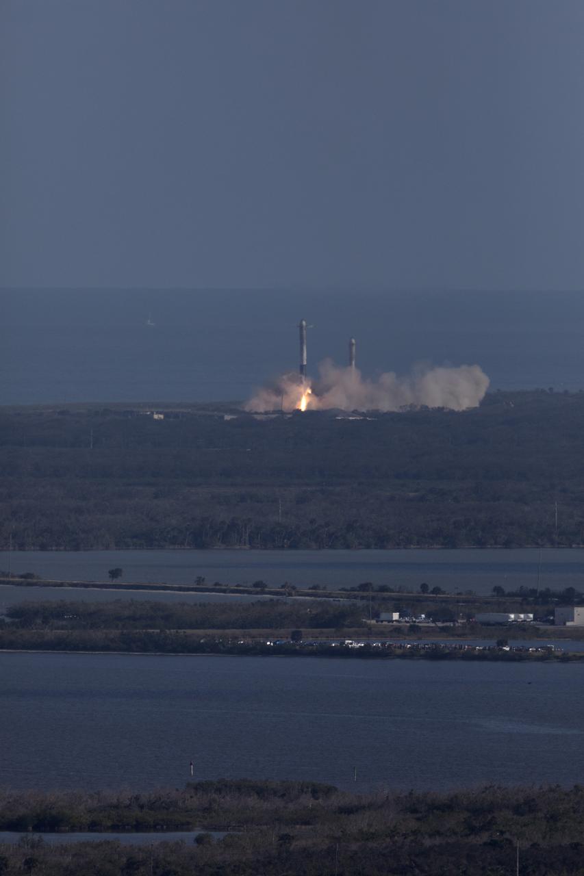 The SpaceX Falcon Heavy rocket’s two side cores descend toward landing at Cape Canaveral Air Force Station in Florida following a successful liftoff at 3:45 p.m. EST from Launch Complex 39A at NASA's Kennedy Space Center. This demonstration flight is a significant milestone for the world's premier multi-user spaceport. In 2014, NASA signed a property agreement with SpaceX for the use and operation of the center's pad 39A, where the company has launched Falcon 9 rockets and prepared for the first Falcon Heavy. NASA also has Space Act Agreements in place with partners, such as SpaceX, to provide services needed to process and launch rockets and spacecraft.