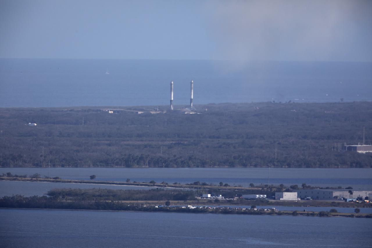 The SpaceX Falcon Heavy rocket’s two side cores descend toward landing at Cape Canaveral Air Force Station in Florida following a successful liftoff at 3:45 p.m. EST from Launch Complex 39A at NASA's Kennedy Space Center. This demonstration flight is a significant milestone for the world's premier multi-user spaceport. In 2014, NASA signed a property agreement with SpaceX for the use and operation of the center's pad 39A, where the company has launched Falcon 9 rockets and prepared for the first Falcon Heavy. NASA also has Space Act Agreements in place with partners, such as SpaceX, to provide services needed to process and launch rockets and spacecraft.